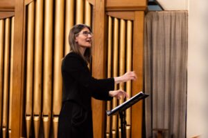 Nicola Starkie, conducting choral music in Birmingham UK classical choral concert, Quinborne choir concert